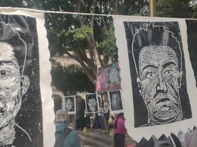 - Una protesta en Puebla, México, por los 43 estudiantes que, según sus padres, fueron desaparecidos forzadamente por criminales organizados y fuerzas de seguridad.