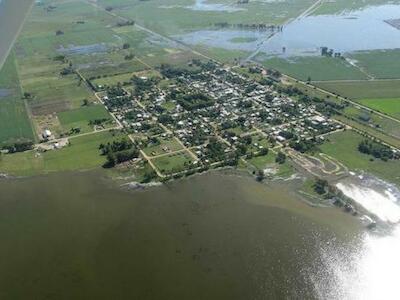 Siembra agronegocio, cosecha inundación